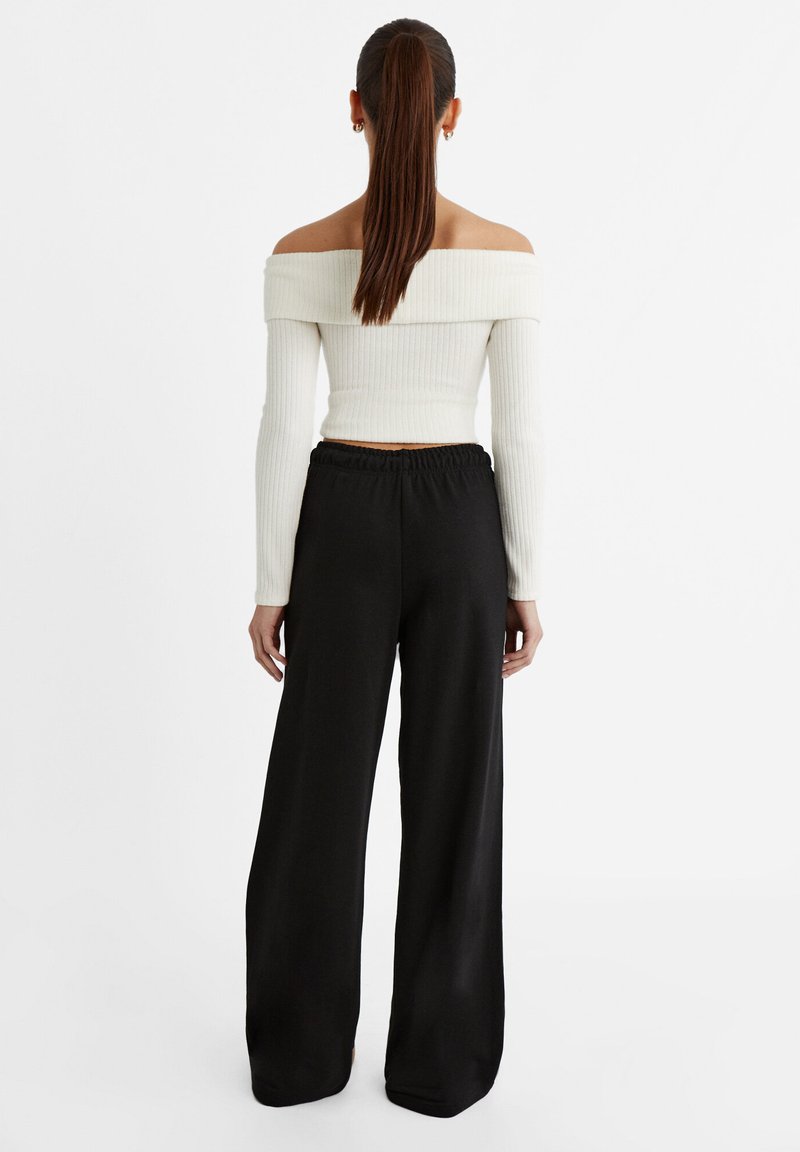 Stradivarius Stradivarius WIDE-LEG JOGGER - Tracksuit bottoms - black Kostenloser Versand international