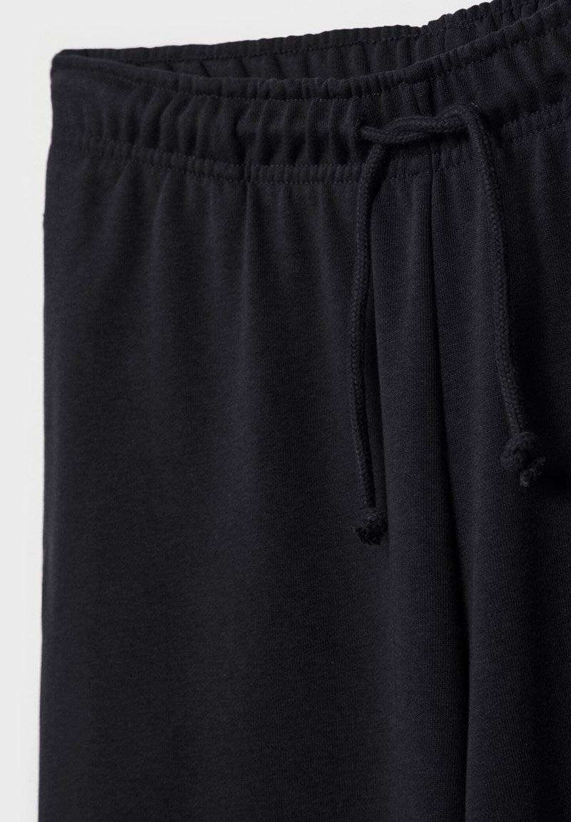 Stradivarius Stradivarius WIDE-LEG JOGGER - Tracksuit bottoms - black Kostenloser Versand international
