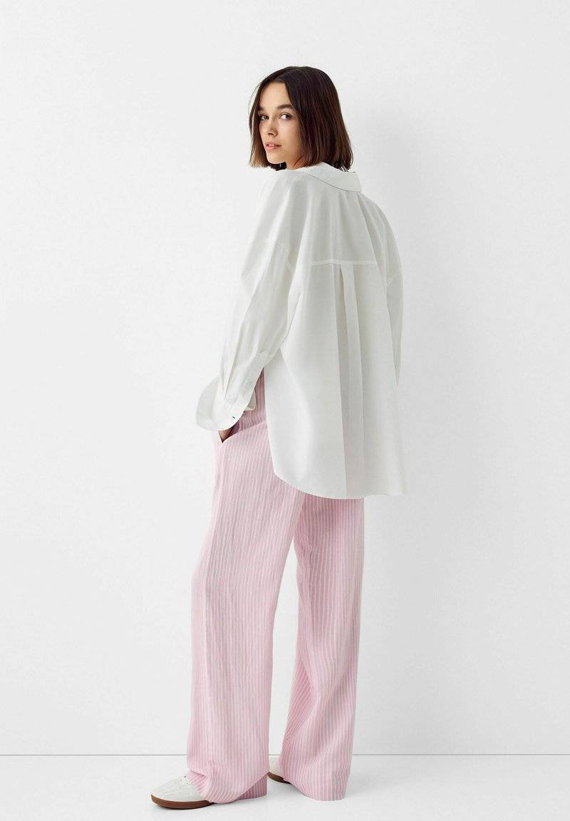 Bershka Bershka WITH AN ELASTIC - Trousers - light pink Riesige Rabatte