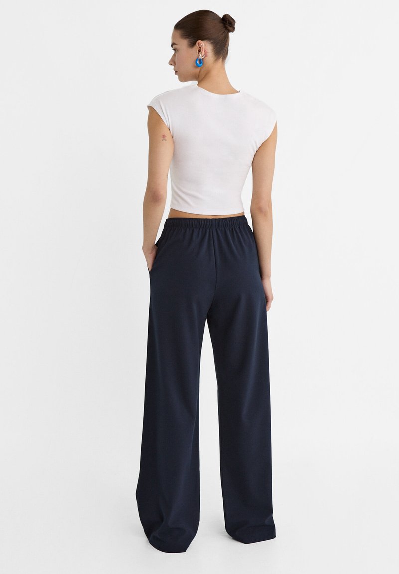 Stradivarius Stradivarius LONG FLOWING - Trousers - mottled dark blue Kostenloser Versand international