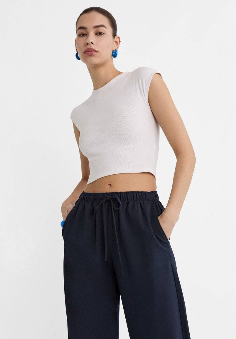 Stradivarius Stradivarius LONG FLOWING - Trousers - mottled dark blue Kostenloser Versand international