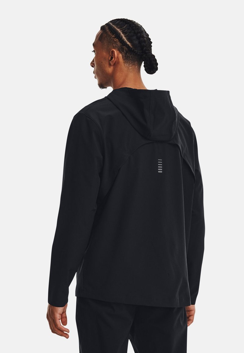 Under Armour Under Armour OUT THE STORM - Running jacket - black jet gray reflective Saisonschlussverkauf
