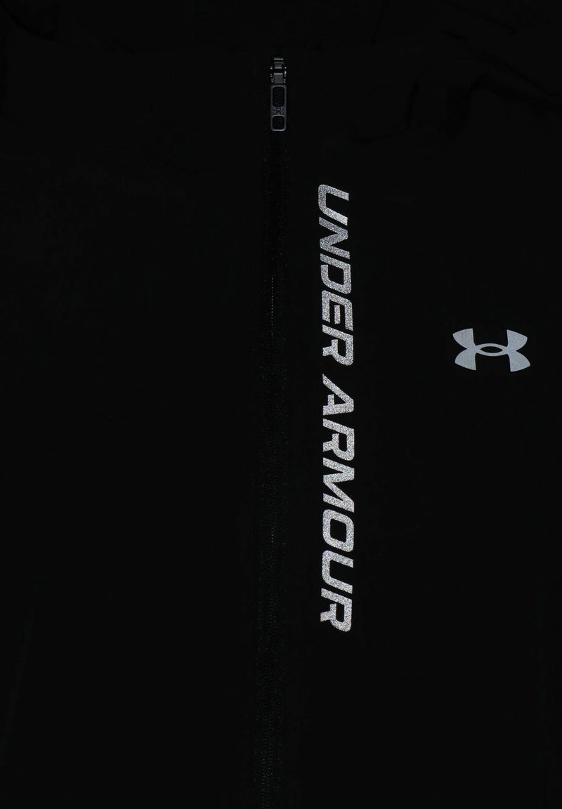Under Armour Under Armour OUT THE STORM - Running jacket - black jet gray reflective Saisonschlussverkauf