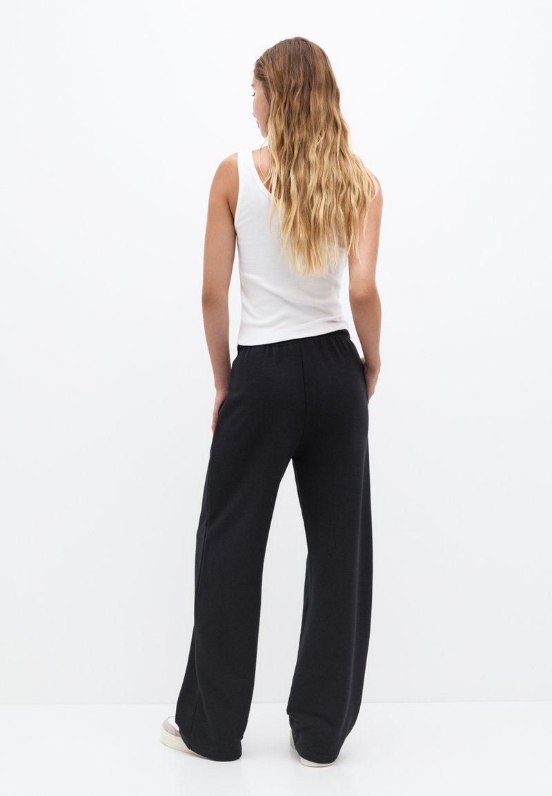 PULL&BEAR PULL&BEAR WIDE-LEG - Tracksuit bottoms - black Speichern exportieren