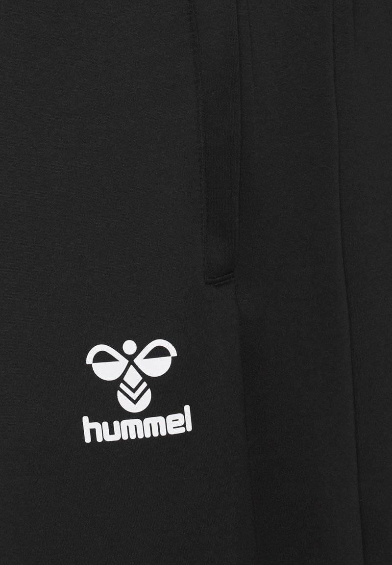 Hummel Hummel CORE XR TRAINING PANTS - Tracksuit bottoms - black Outlet